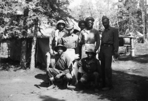 93rd Black Engineers, cooks, caught fish at Tagish River. Hurray! No Spam for dinner tonight. 1942