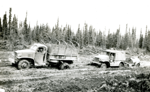 NARA246png 770 340th Engr Truck pulling water wagon near Smart river.