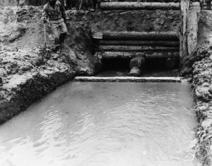 Black 93rd engineers build culverts on Alaska Highway to drain water. 1942