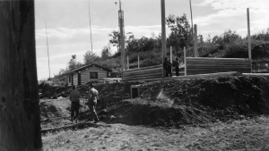 93rd Engineers constructing buildings in Teslin Villaga. 1942
