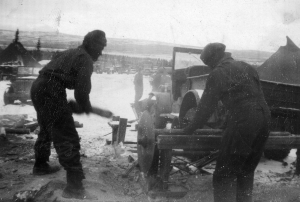 93rd Black soldiers operate sawmill in the winter to cut firewood for stoves.