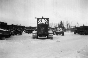 Deadlined bulldozer and other equipment at 93rd Motor Pool at Morley Bay. 1942
