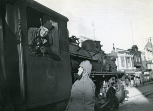 Engineer and Army officer discuss railroad operations. 1942