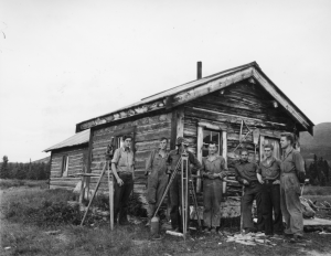 Company D, 29th Topo Engineers, field camp at 26.5 miles from Whitehorse. Sgt. Harley, T/3 Williams, Pfc Dooley, T/3 Blethen, Pvt. Cross, Pvt Johnson, T/Sgt Nielsen. 3 Aug 42